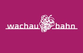 Logo Wachaubahn mit Weintrauben in der Mitte